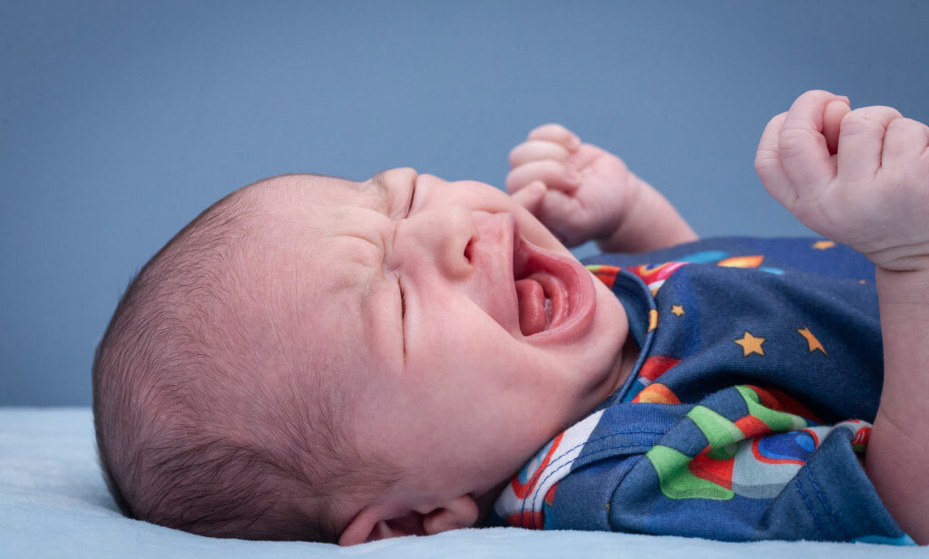 Is your newborn baby crying when you lay them down?Is your newborn baby