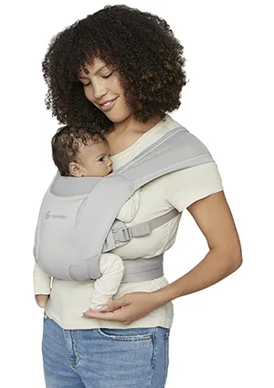 Mom using Embrace Newborn Front Carry